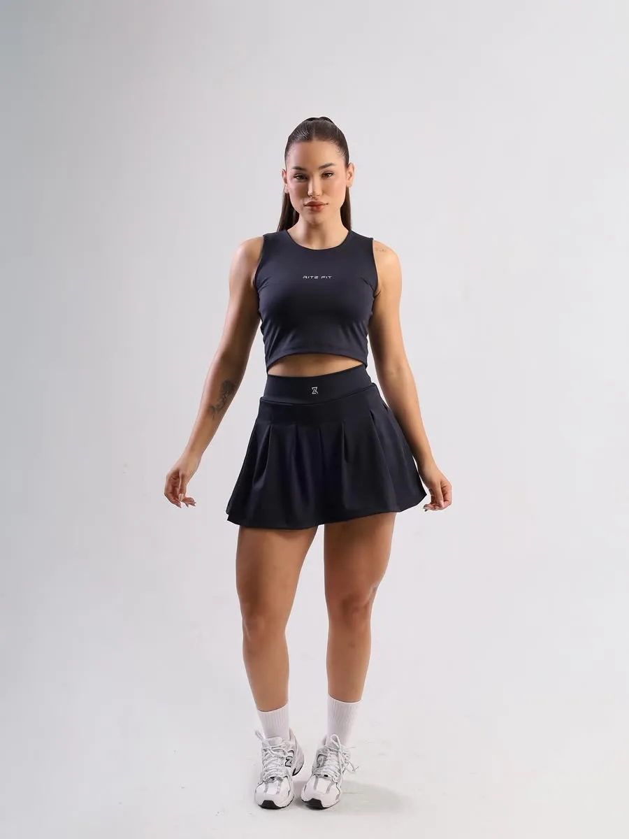 Peça fitness — top e saia preta